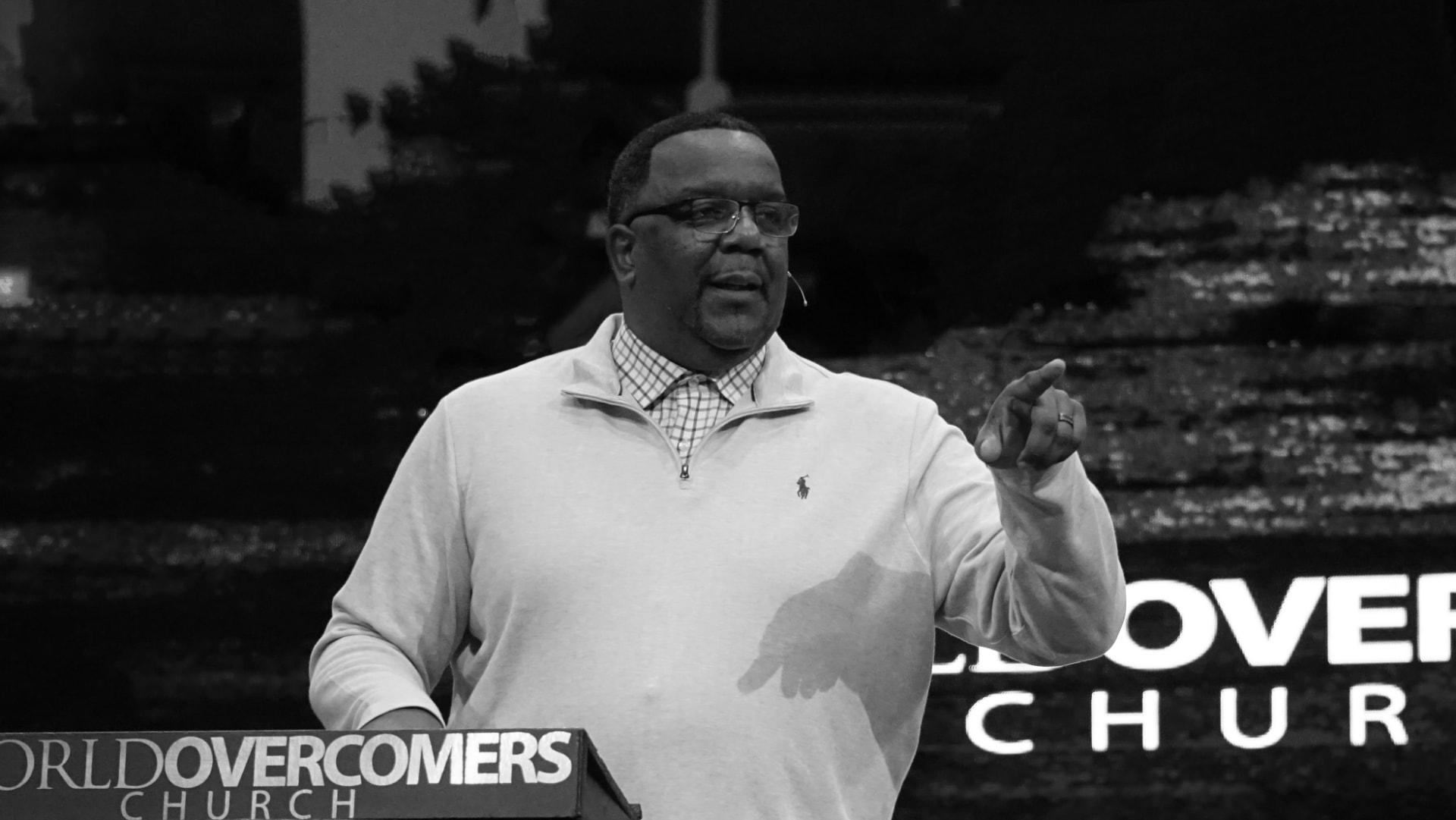 Pastor preaching at World Overcomers Church